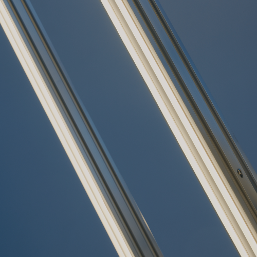 Close-up of Beams of Light Menorah LEDs with a blue sky background